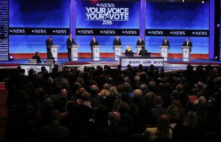 Republican U.S. presidential candidates discuss an issue at the Republican U.S. presidential candidates debate sponsored by ABC News at Saint Anselm College in Manchester